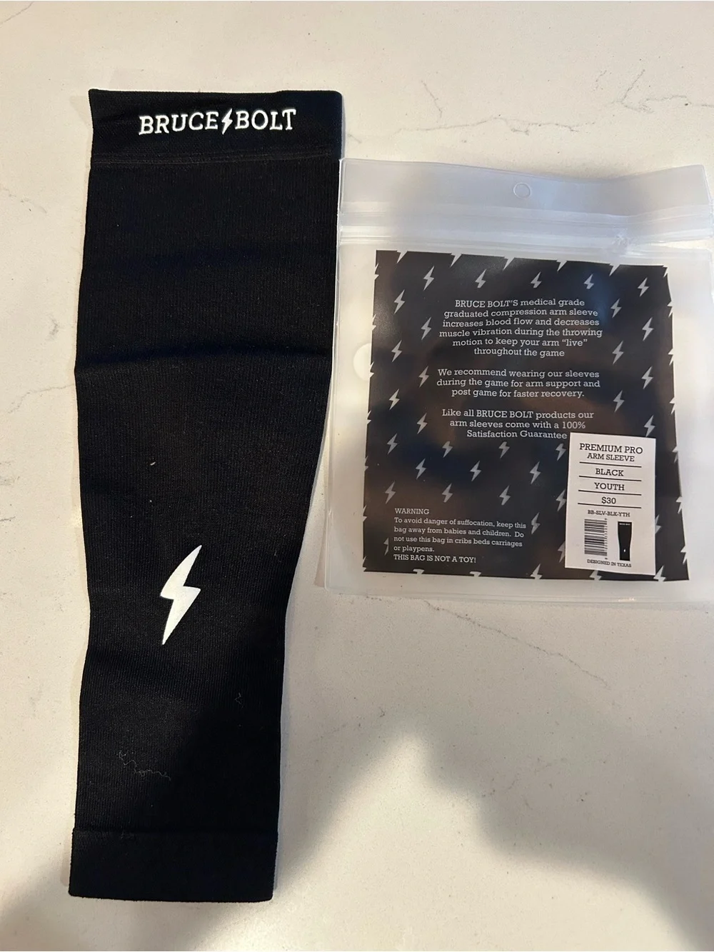 Bruce Bolt Black Youth Compression Arm Sleeve - Performance Support